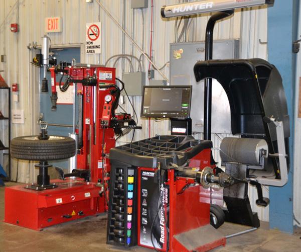 Wheel servicing equipment